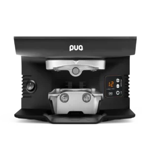 PUQ Press M6 precision automatic coffee tamper for high-volume cafés, available from Peak Coffee Techs in Colorado Springs and Denver